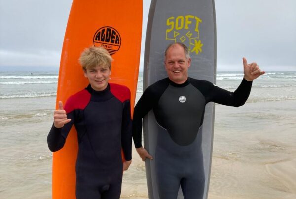 Father & son learning to surf